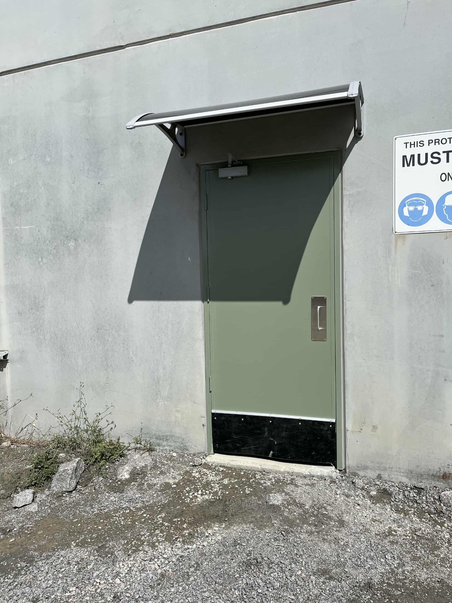 Installation of commercial grade door and awning